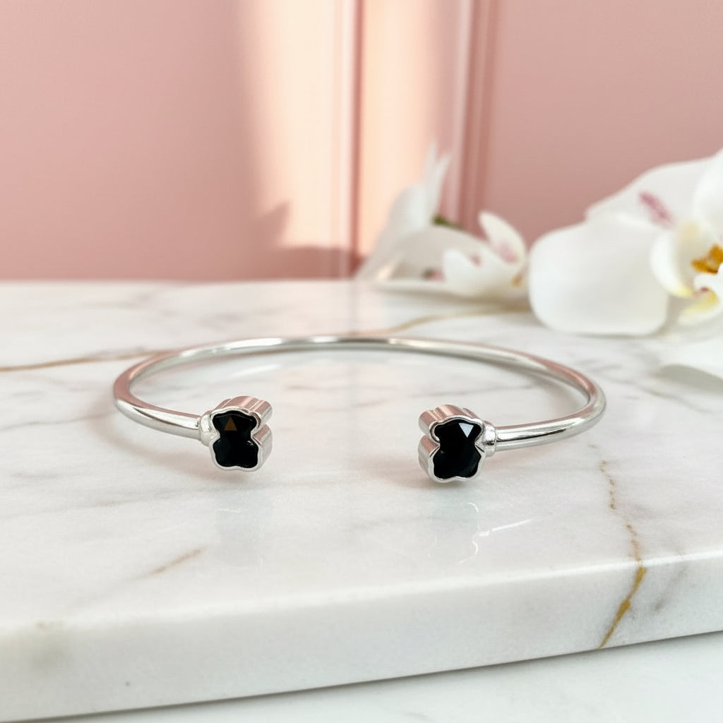 Brazalete doble oso con Onix facetado baño de rodio
