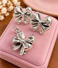 Set de aretes y dije Moño Electro formado Plata 925